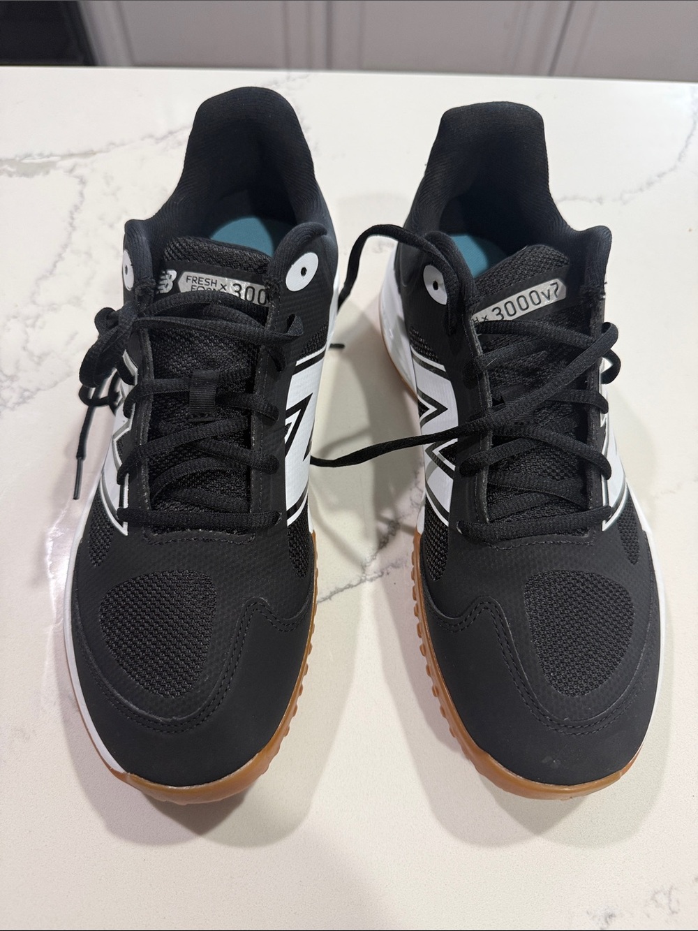 New Balance Black and White Athletic Sneakers with Gum Sole